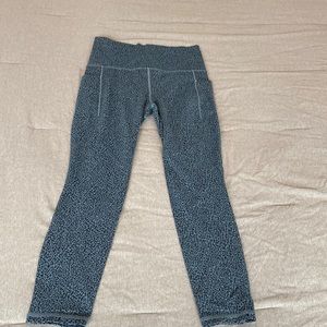 Athleta salutation stash 2 leggings in blue and black cheetah print. Size small